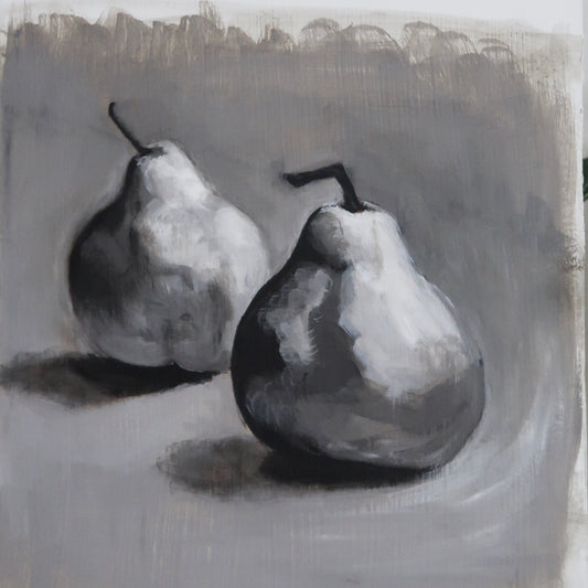 Two pears on a textured gray background